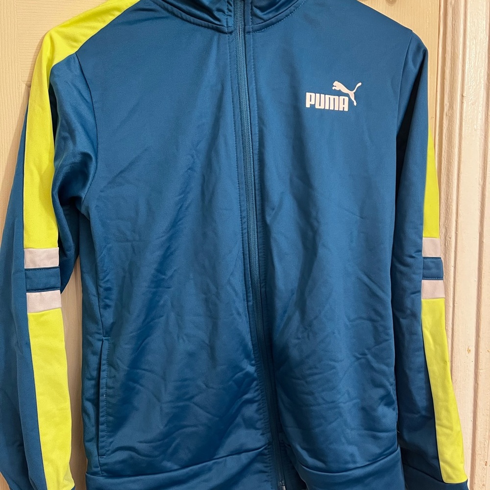 Puma girls top with green and blue sleeve
